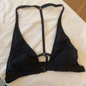 Black bralette with strappy back size small. Free people.